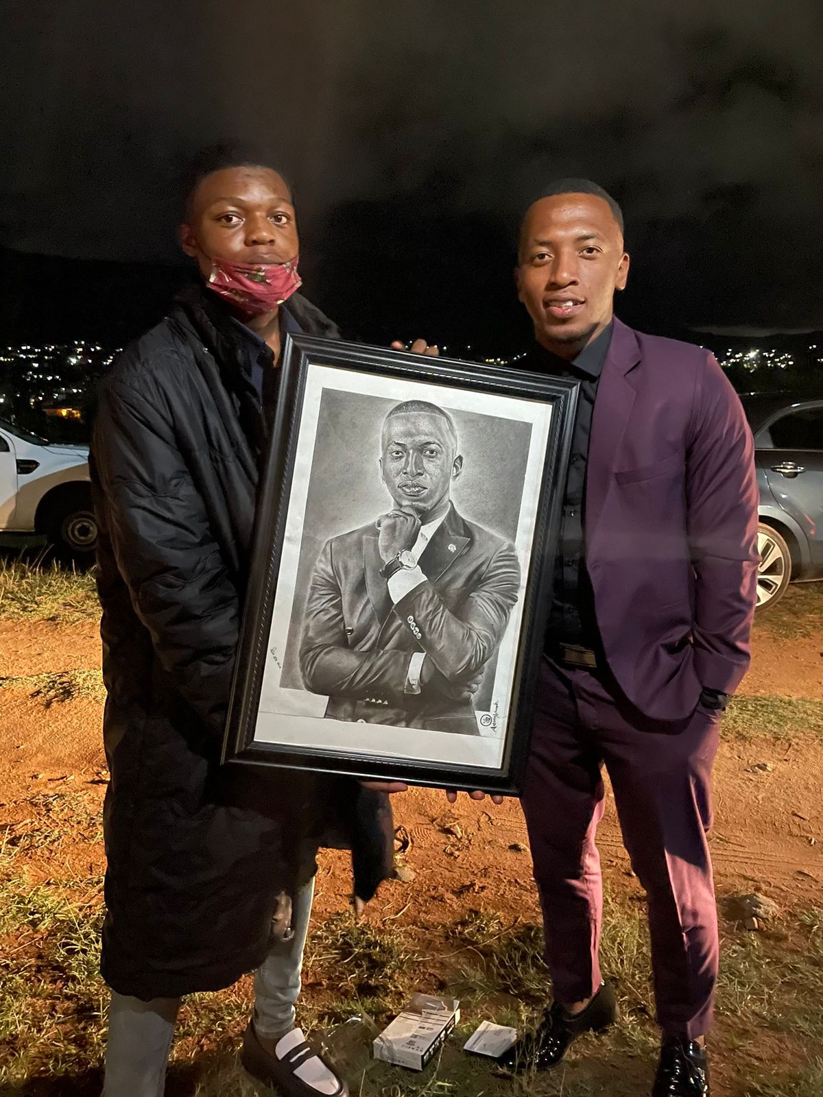 Dumi Mkokstad with artwork